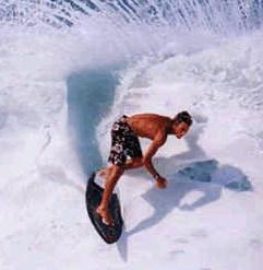 Ripping on a skimboard for fun